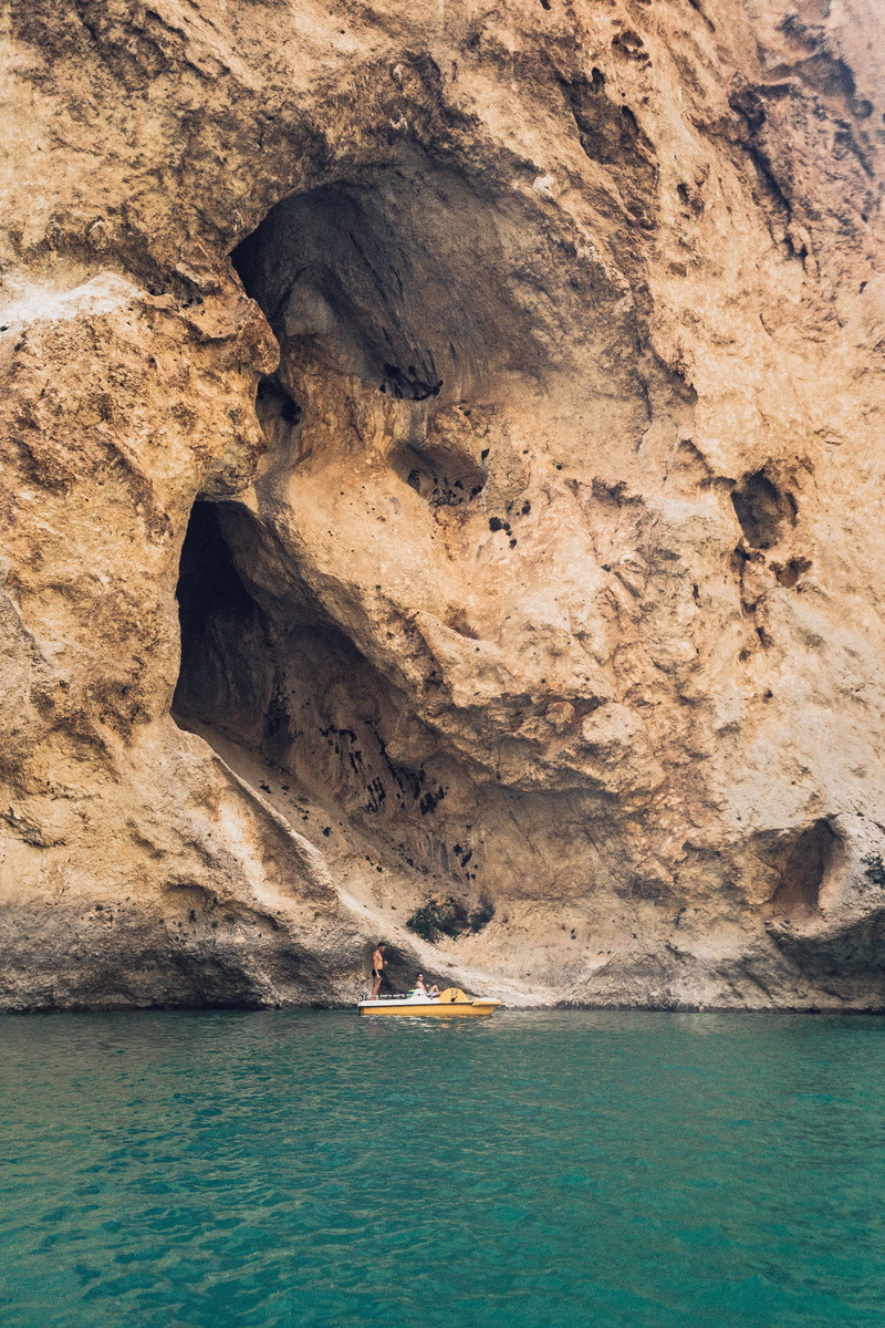 boat, outdoors, couple, time, lake, rock, day, riding, formation, france, solid, beauty in nature, near, woman, non-urban scene, iphoneonly, nature, man