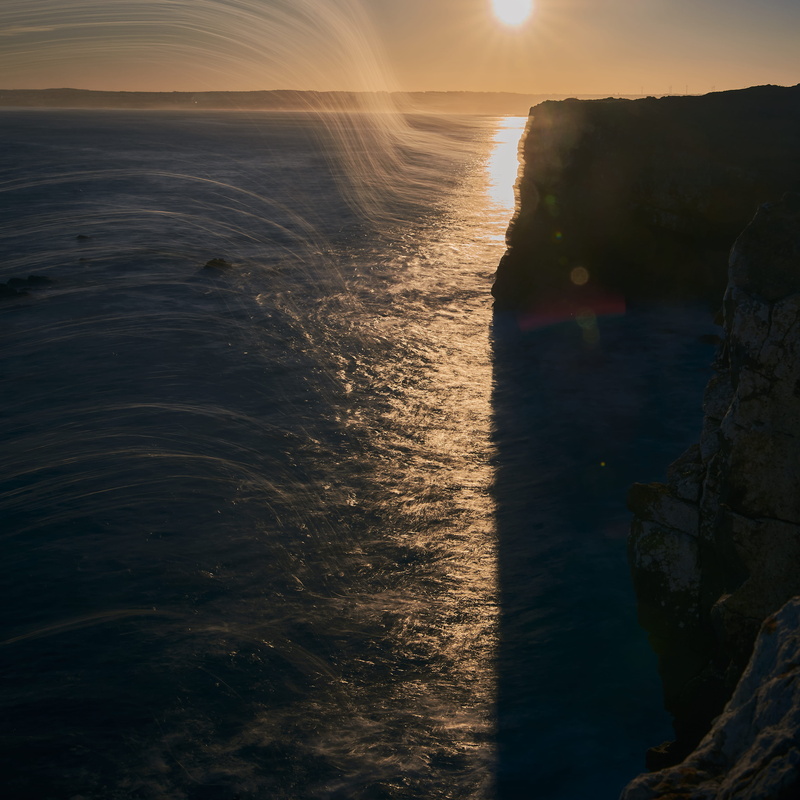 motion, sunset, flowing, sunlight, rock, portugal, nature, solid, power in nature, scenics - nature, lens flare, light, flowing water, water, seas, dawn