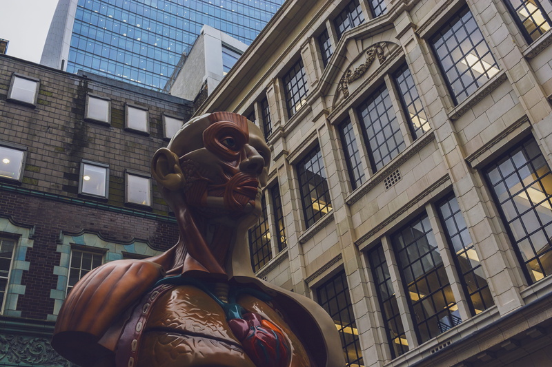 craft, low angle view, art, streets, window, human representation, building, female likeness, outdoors, united kingdom, statue, nature, representation