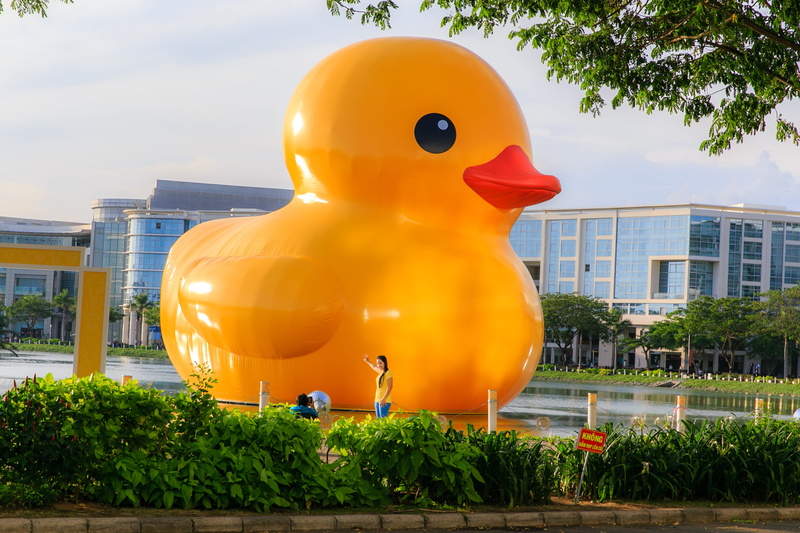 nature, growth, architecture, travel, statue, rubber duck, outdoors, yellow, human representation, tree, duckling, toy, daylight, landscape, floating, plant