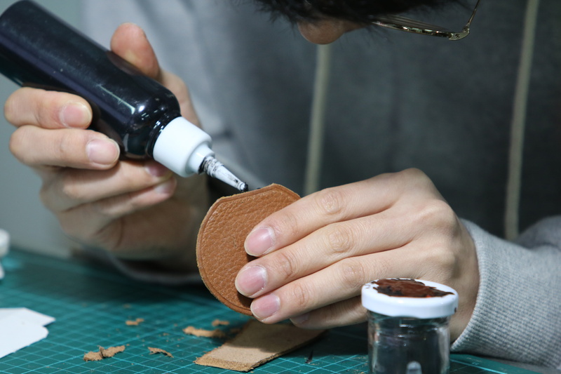 sewing, midsection, human body part, tool, skill, antique, hand, table, front view, indoors, education, occupation, tabitha, kobo, working, finger, one person