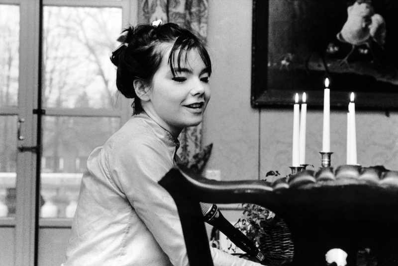 4K, Björk, real people, looking, smiling, adult, home interior, waist up, side view, hairstyle, sitting, leisure activity, portrait, emotion, lifestyles