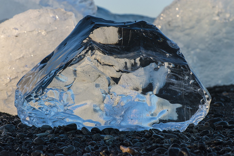 focus on foreground, pollution, solid, frozen, no people, geology, water, beach, environment, nature, close-up, plastic, 5K, outdoors, blue, rock, iceland