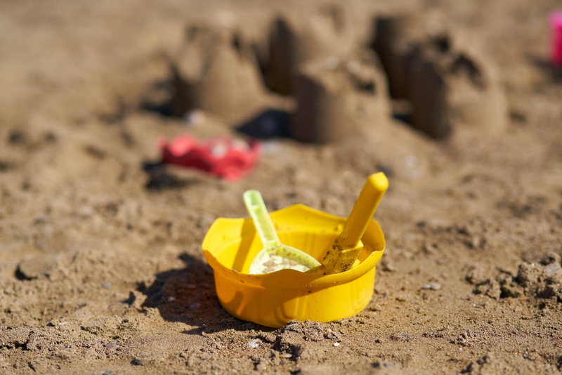 close-up, toy, yellow, land, entertainment, children, happiness, nature, dirt, holiday, 8K, sand, travel, outdoors, food, sunlight, family, no people