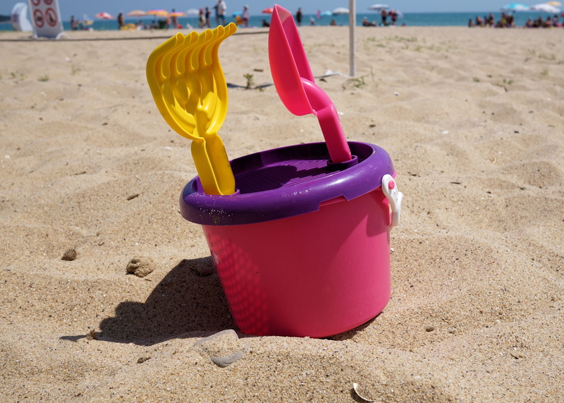 land, container, yellow, coast, holiday, summer, 4K, beach, close-up, outdoors, sand, no people, bucket, spade, children toys, sea, shadow, toy, water
