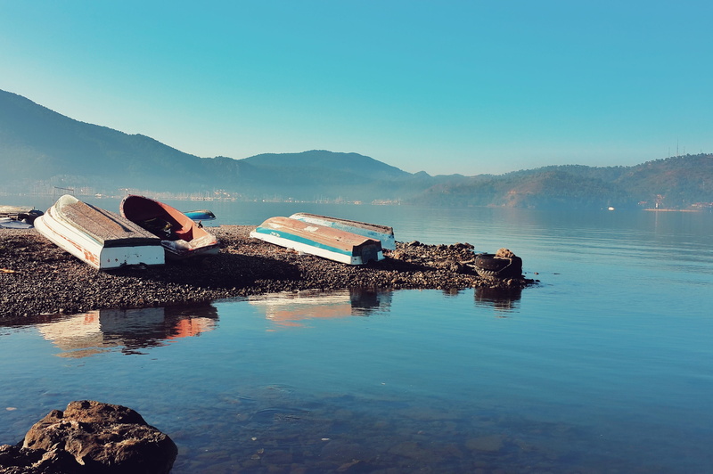 fethiye, boats, water, blue, retro, outdoors, no people, mountain, tranquil scene, beauty in nature, bay, architecture, tranquility, mountain range, lake