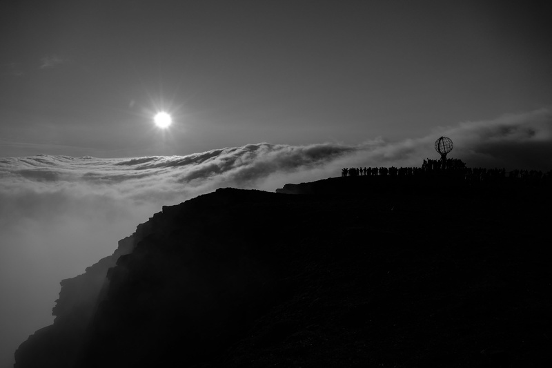 outdoors, low angle view, sun, non-urban scene, moon, landscape, beauty in nature, nature, tranquil scene, north cape, silhouette, sky, tranquility, mountain