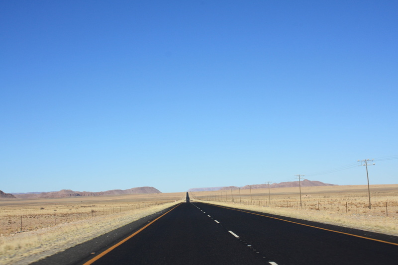 2K, semi-arid, horizon, no people, country, diminishing perspective, environment, outdoors, clear sky, sign, straight, endless, uSA, transportation, highway