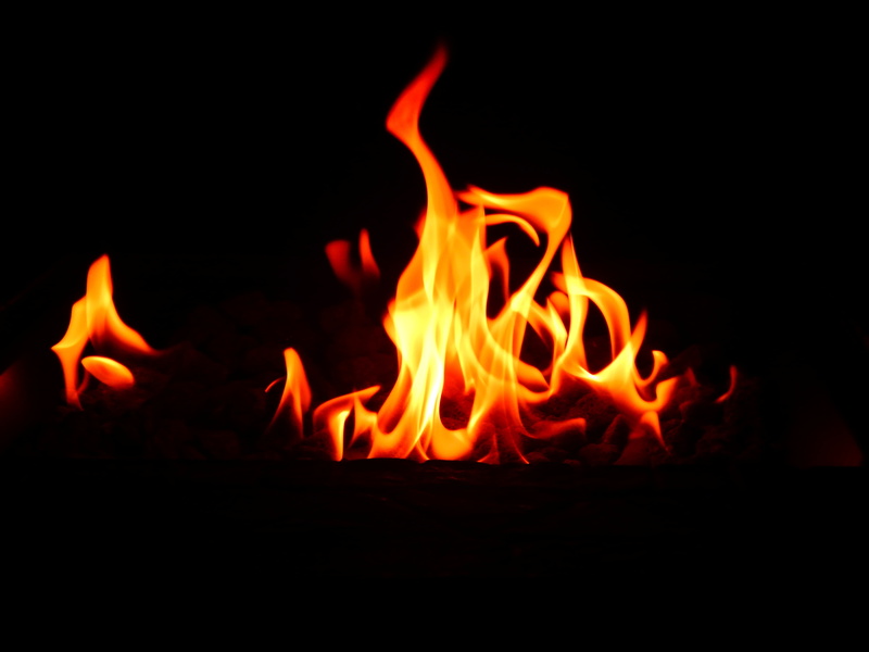 yellow, comfort, relaxation, fire, heat - Temperature, no people, house, black background, flame, comfortable, black Color, heat, night, hot, resting, glowing