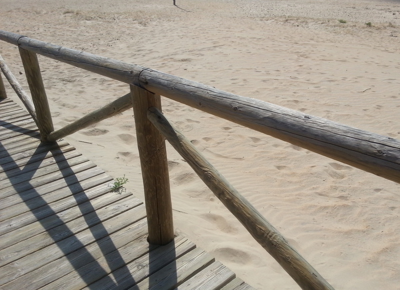 sea, high angle view, the away, no people, outdoors, water, boardwalk, safety, web, architecture, footprints, railing, conil de la frontera, costa de la luz