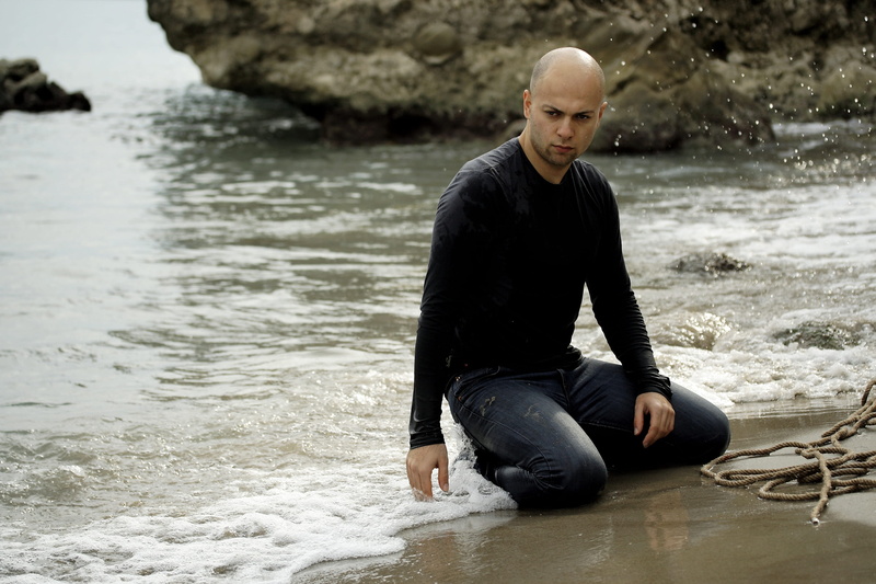 one person, full length, sea, waterfront, leisure activity, fashion, fiction, suicide, adult, lifestyles, young men, wet, psychology, marine, men, water