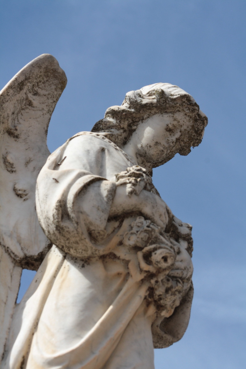 tombstone, male likeness, religion, day, religious, cemetery, representation, carving - craft product, outdoors, catholic, no people, art and craft, peace
