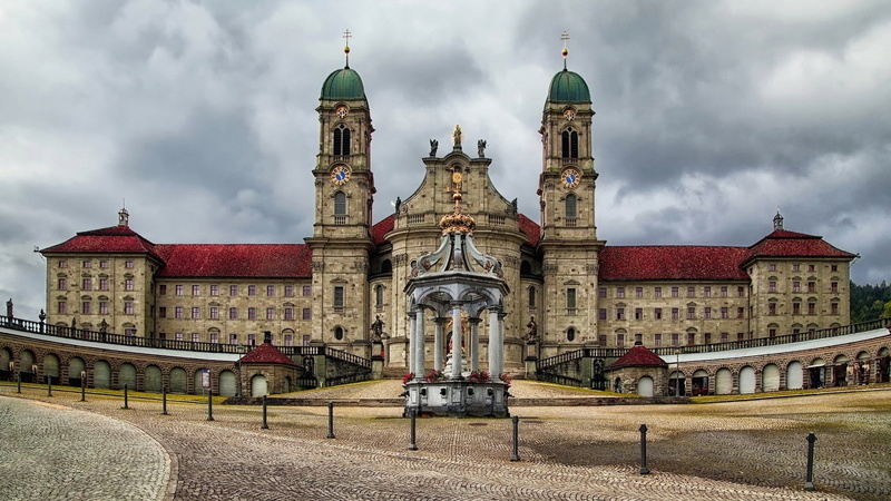cloud - sky, clock tower, sky, Einsiedeln, building exterior, dome, religion, travel destinations, incidental people, nature, spire, arch, history, belief