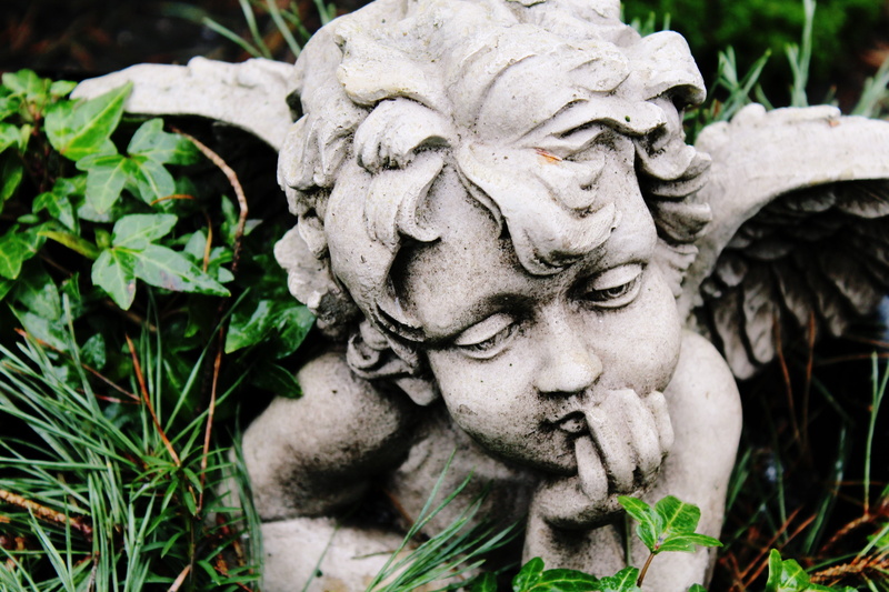 sky, representation, focus on foreground, sculpture, mourning, pray, human representation, emotion, plant part, plant, art and craft, flowers, faith, symbol