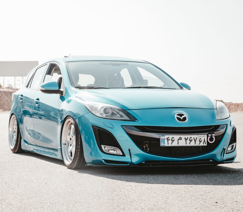 automobile, blue, copy space, mode of transportation, luxury, clear sky, hatchback, sedan, background, utilities, ground, utility, stationary, tehran province