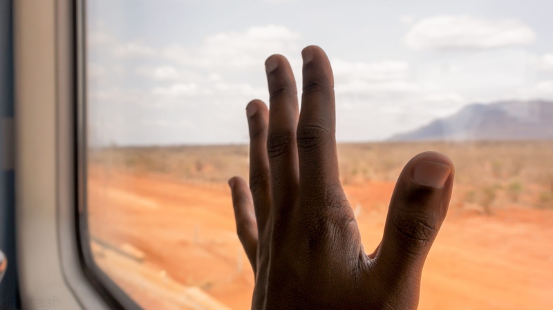 railway, finger, close, passenger, holding, outdoors, glass - material, person, hand, human hand, sky, photography, vehicle, body part, transport, landscape