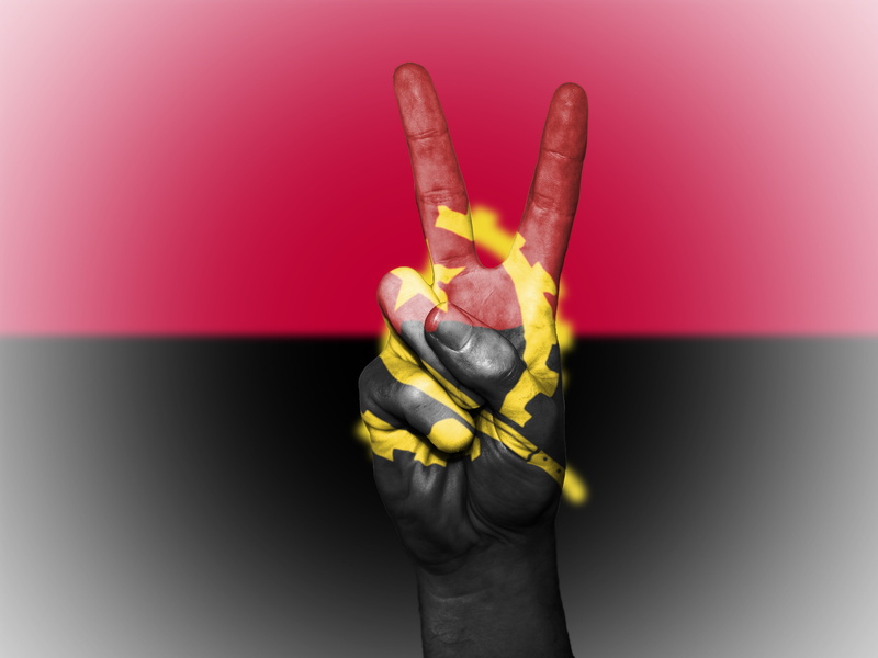 colored background, national, red, icon, indoors, gray, yellow, human body part, hand, human finger, people, finger, body part, holding, official, copy space