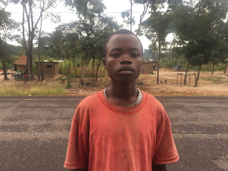 farmer, 4K, males, portrait, real people, road, standing, nature, lifestyles, child, outdoors, front view, boys, looking at camera, angola, one person