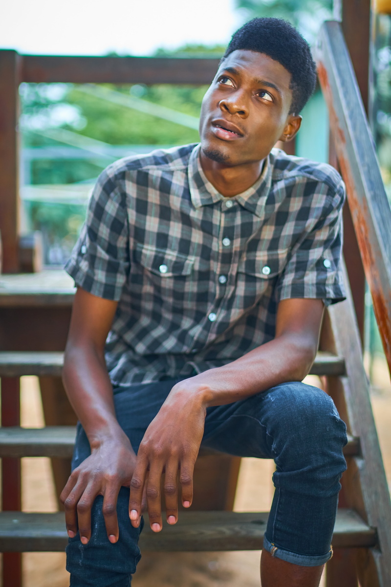 real people, lucas cândido fumba, fumba, lifestyles, checked pattern, wawera in angola, one Man Only, one Person, person, leisure activity, looking, front view
