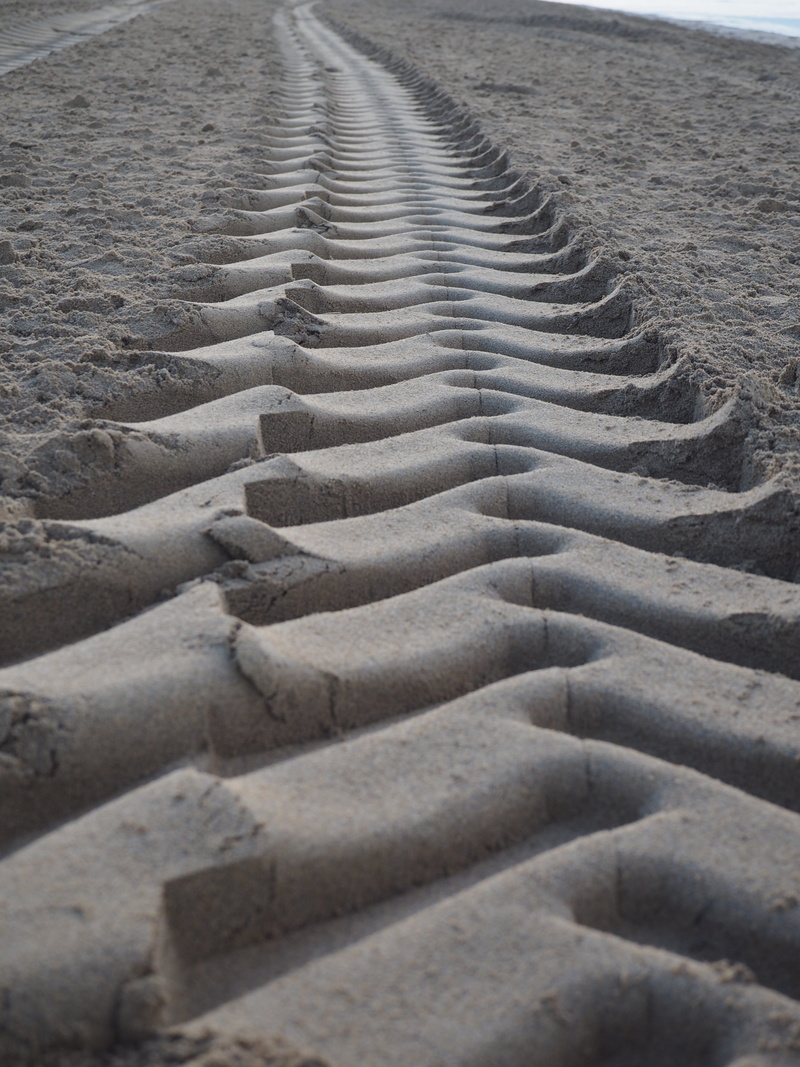 beach, tire tracks, high angle view, solid, sand beach, surface level, sea, staircase, backgrounds, textured, outdoors, in a row, tranquility, away, land