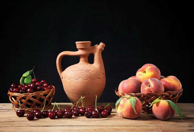 grape, container, fruit, black background, pitcher - jug, cherry, studio shot, drink, agriculture, berries, peach, large group of objects, still life, wellbeing