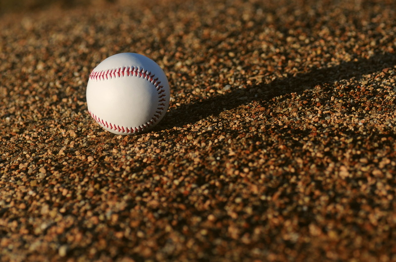land, outdoors, brown, sunlight, sand, stitch, no people, leisure games, single object, ball, close-up, sports equipment, baseball - sport, baseball, soil