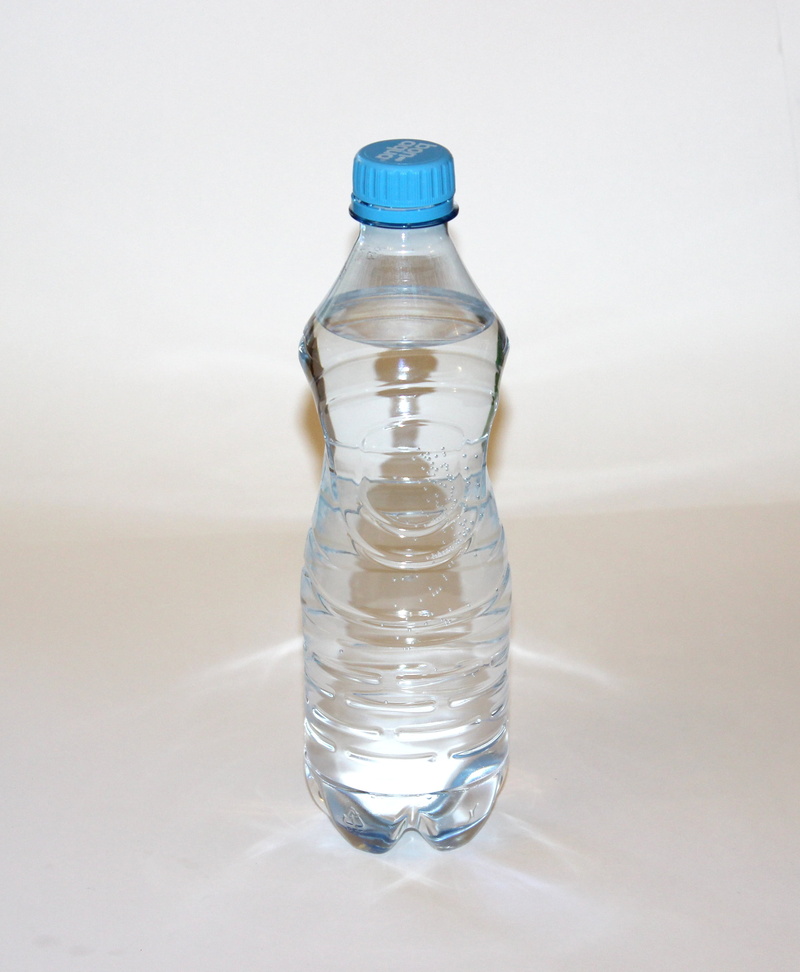 indoors, studio shot, purity, bottle, white background, transparent, single object, water, glass - material, purified water, empty, no people, mineral