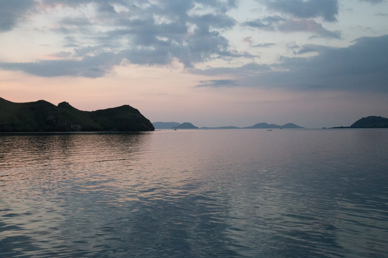 no people, mountain, national park, mountain range, day, sky, rippled, beauty in nature, outdoors, reflection, waterfront, komodo national park, komodo