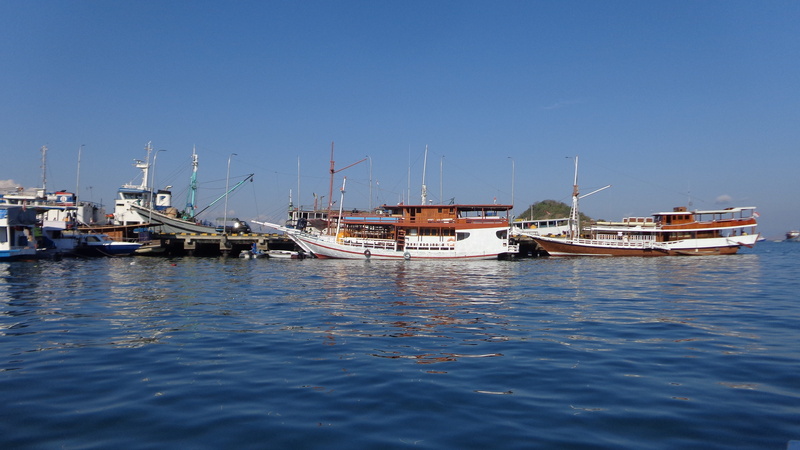boat, moored, no people, sky, mast, komodo island, copy space, mode of transportation, sea, travel, blue, sailboat, fishing boat, transportation, nautical vessel