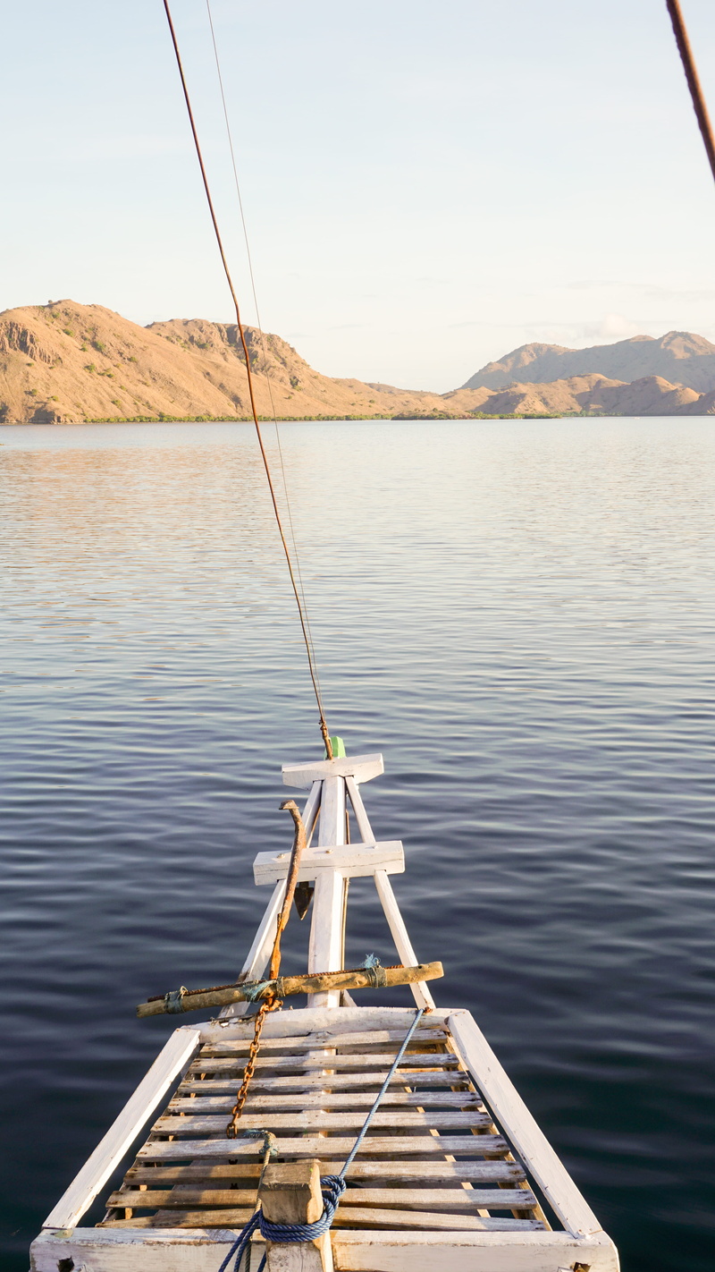 rippled, hill, nautical vessel, water, dinghy, body, no people, nature, sky, transportation, transport, day, west manggarai, pier, indonesia, mountain