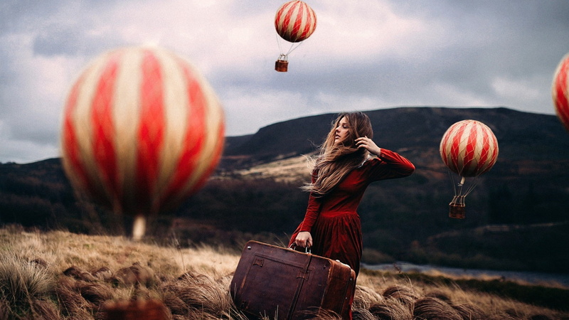 model, windy, depth of field, adult, hills, hot air balloons, beauty in nature, land, flying, sky, nature, balloon, looking away, hair, air vehicle, women outdoors