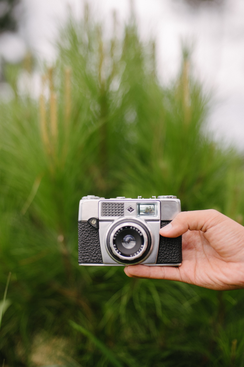 agfa, leisure activity, photography, focus on foreground, one person, analog, camera, technology, travel, camera - photographic equipment, holding, nature
