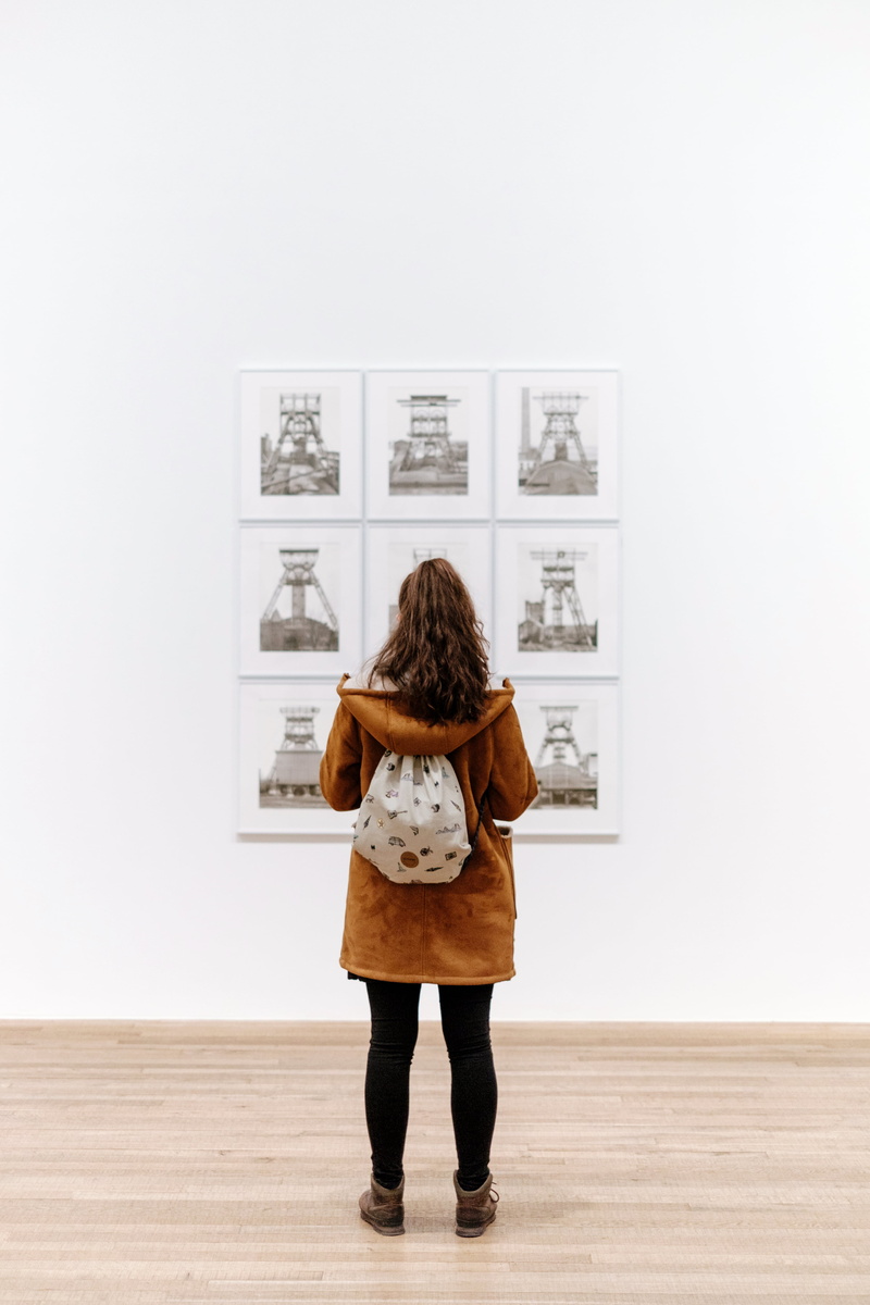 wall - building feature, childhood, front, white, alone, contemplation, day, woman, females, one woman only, frame, only women, people, warm clothing, art