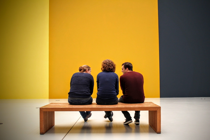 visitors, wooden, adult, males, art, couple - relationship, indoors, side by side, people, wall - building feature, Visitors, copy space, bench, wood - material