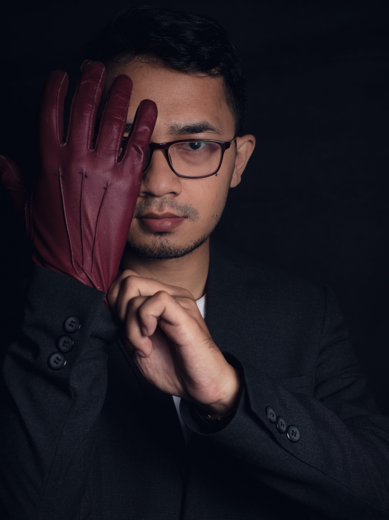 style, portrait, model, human hand, hand, real people, glove, male, gloves, one person, studio shot, glasses, lifestyles, potrait, human, 4K, jacket, looking at camera