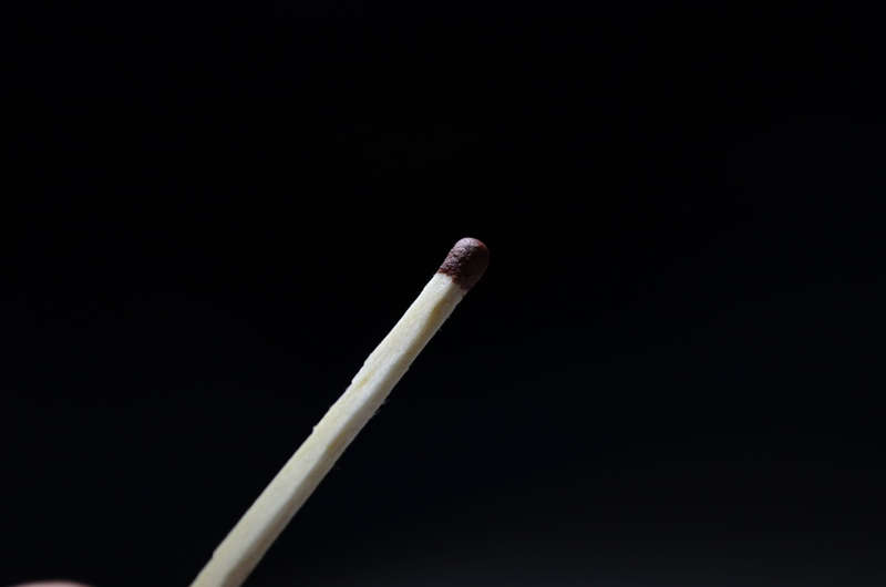 single object, standing out from the crowd, Background, macro, black background, closeup, large, flame, no people, focus on foreground, close-up, lighting equipment