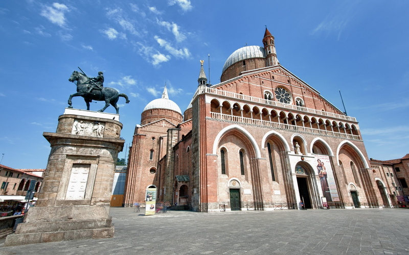 travel, sculpture, monument, building exterior, outdoors, built structure, city, dome, basilica of saint anthony of padua, sky, incidental people, cloud - sky