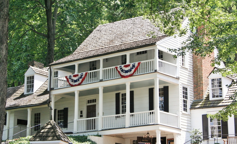 bunting, outdoors, 2K, city, publick house, built structure, tavern, no people, window, building, house, flag, low angle view, guest house, historic, architecture