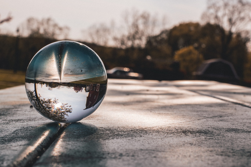 road, silver colored, clear, shadow, plant, sphere, nature, shape, outdoors, 5K, sky, close-up, light, selective focus, tree, upside down, focus on foreground