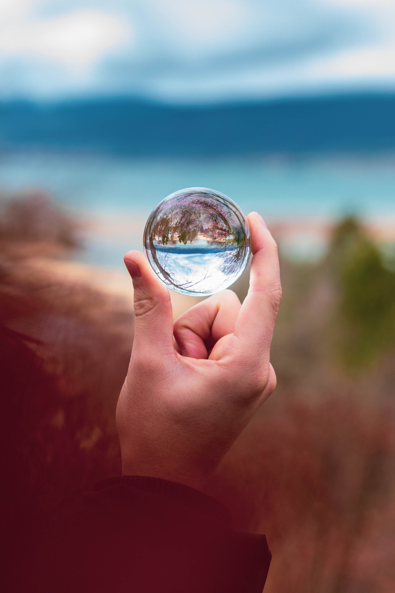 human hand, 5K, macro, one person, crystal ball, finger, human body part, glass, reflection, day, body part, forecasting, transparent, person, glass - material
