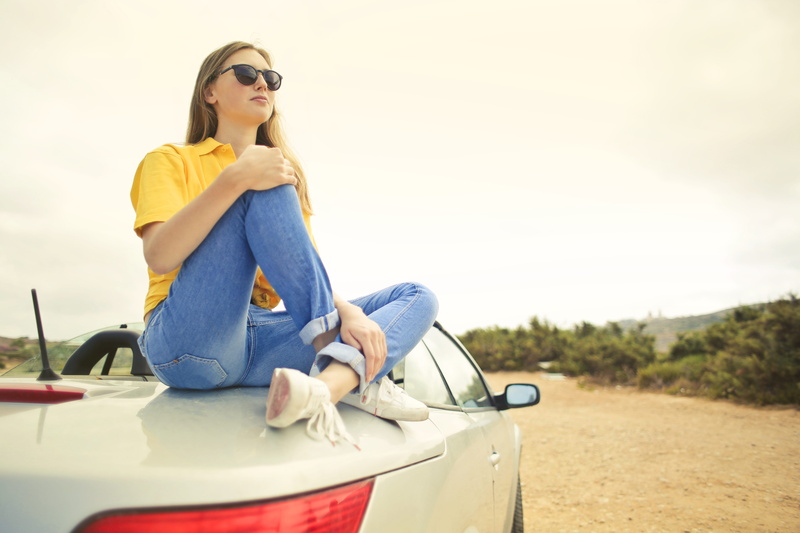 wears, leisure, lifestyles, adult, beautiful woman, recreation, woman, silver, car, transportation, mode of transportation, hairstyle, full length, outdoors