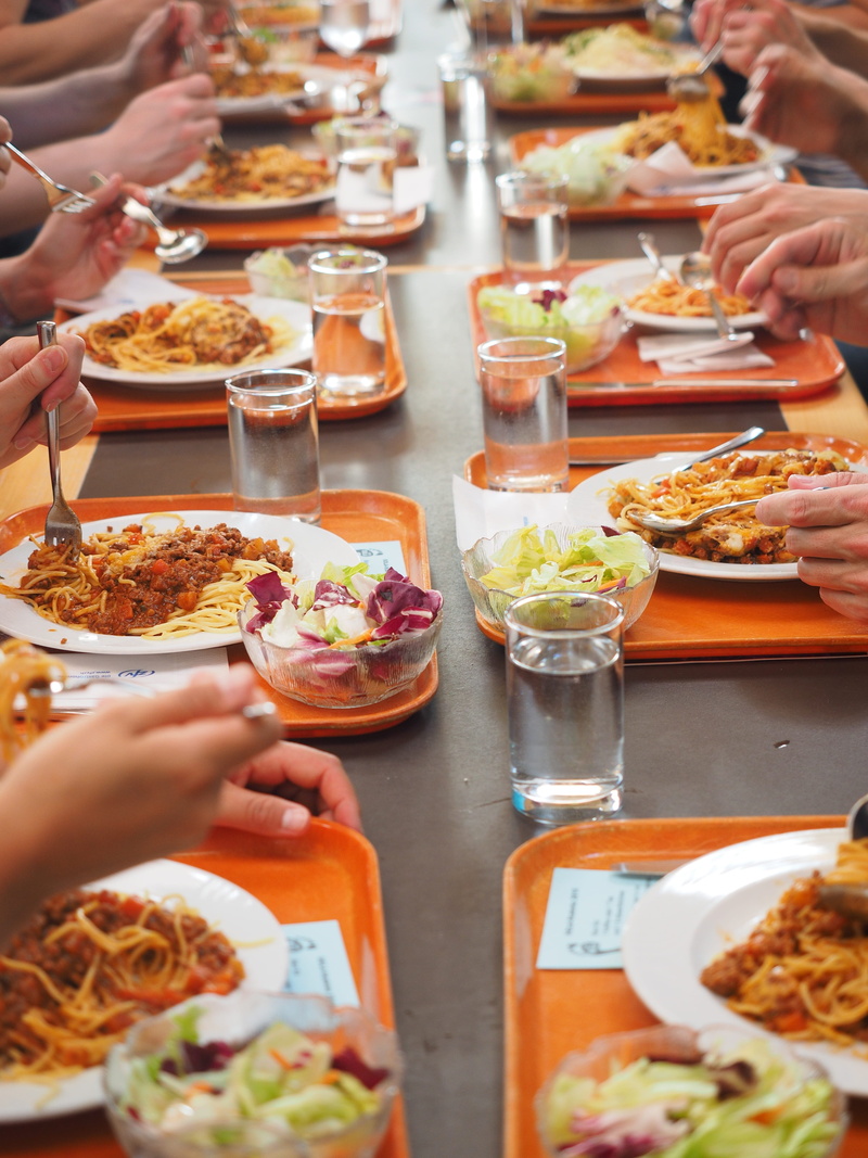 lifestyles, unrecognizable person, industrial kitchen, human body part, large kitchen, togetherness, group of people, body part, food, holding, table, women