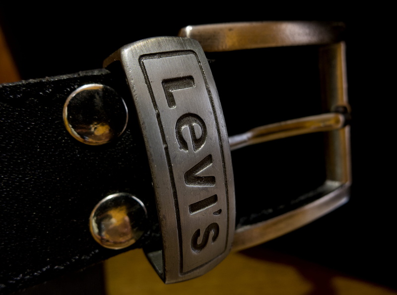 communication, indoors, close-up, belt, studio shot, focus on foreground, arts culture and entertainment, retro styled, bahía blanca, western script, single object