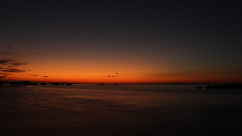 no people, horizon over water, horizon, sea, waterfront, tranquility, isla blanca, dark, reflection, silhouette, copy space, idyllic, tranquil scene, scenics - nature