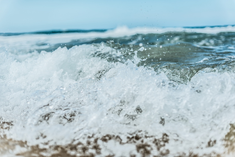 close-up, scenics - nature, power, surfing, beach, clothing, flowing water, day, splashing, beauty in nature, sport, apparel, sports, blue, body, ocean