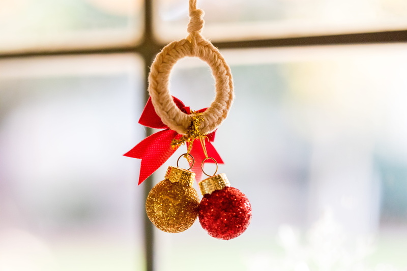 celebration, outdoors, christmas, hanging, jewelry, ribbon - sewing item, day, earring, red, diwali, close-up, heart shape, food and drink, bird feeder