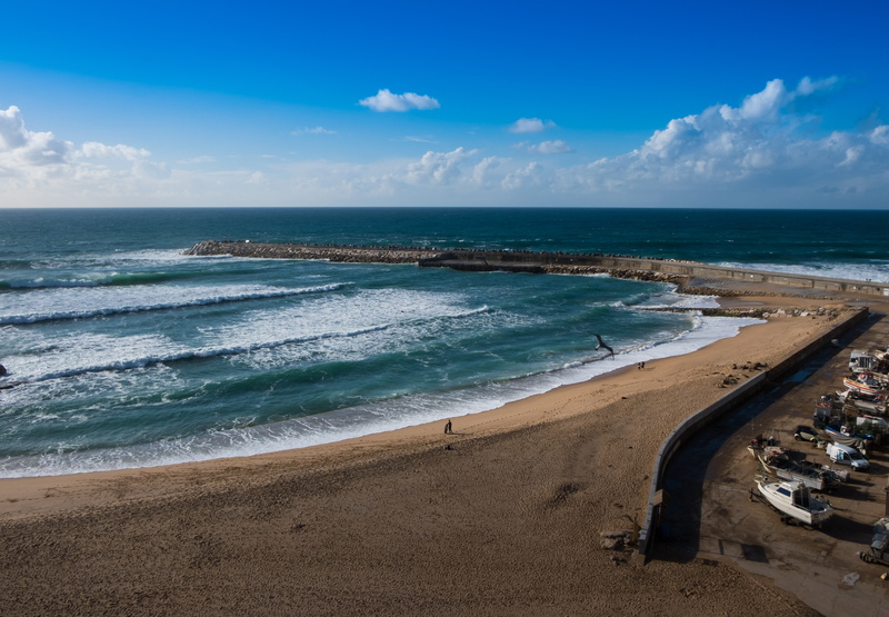 day, motion, no people, ocean, surf, land, blue, outdoors, cloud - sky, tranquil scene, horizon over water, sport, wave, sea, sand, portugal, tranquility