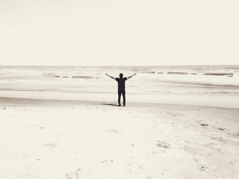 tranquil scene, horizon, human arm, people, horizon over water, male, beach, standing, scenics - nature, leisure activity, seashore, land, sepia, worship