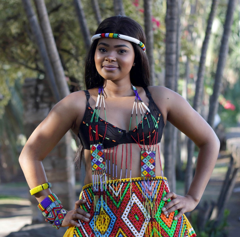 celebration, wear, teenager, performance, focus on foreground, clothing, leisure activity, standing, smile, pose, young, real people, tribe, front view