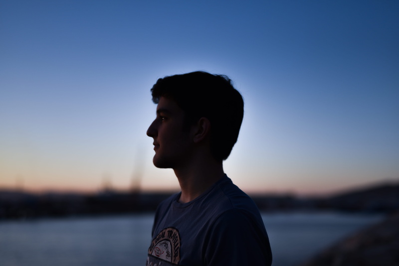 sunset, side view, lifestyles, boy, sky, real people, gibraltar, clear sky, headshot, profile view, young men, young adult, portrait, focus on foreground